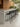 Banqueta Isadora Média com assento em polipropileno e base em aço carbono pintado. Preto #cor_preto