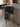 Banqueta Brooklyn estofada em courino sintético PU Preto #cor_preto