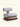 Poltrona Pavia com curva do encosto e base em cinamomo âmbar. off white #cor_off-white