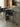 Banqueta Brooklyn estofada em courino sintético PU Preto #cor_preto